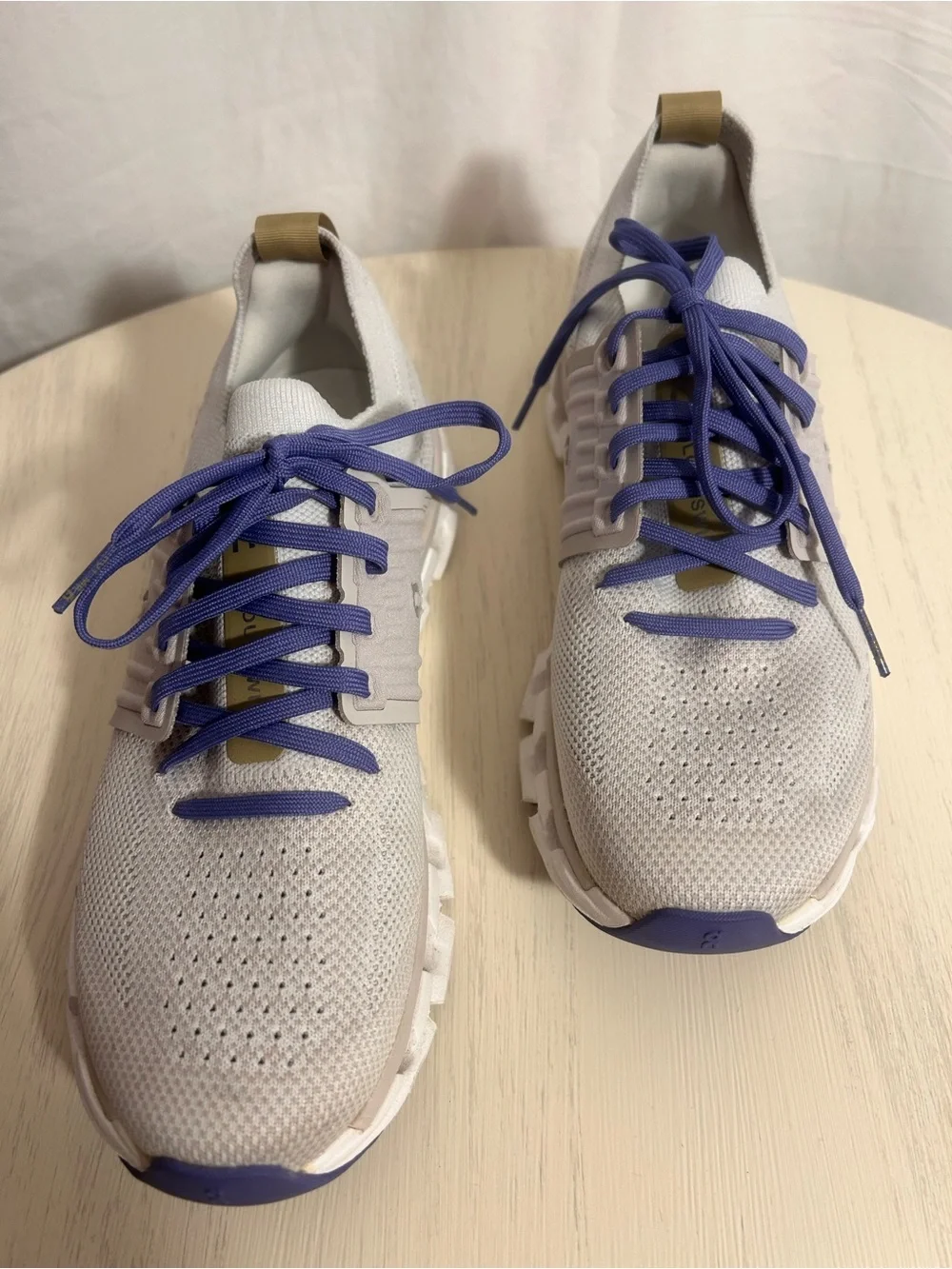 On Running Women’s Sneakers in Light Gray/White with Purple Laces
